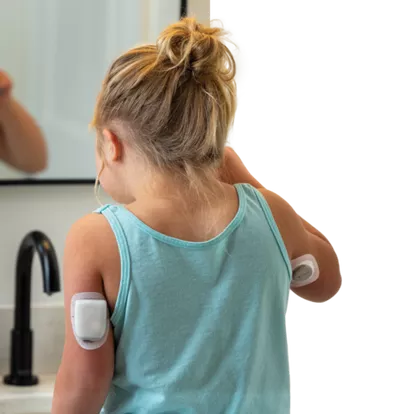Modern Omnipod insulin pump on patient's arm